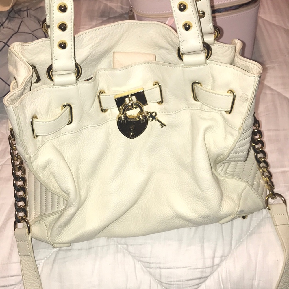 Cream colored juicy couture bag. Only worn a week